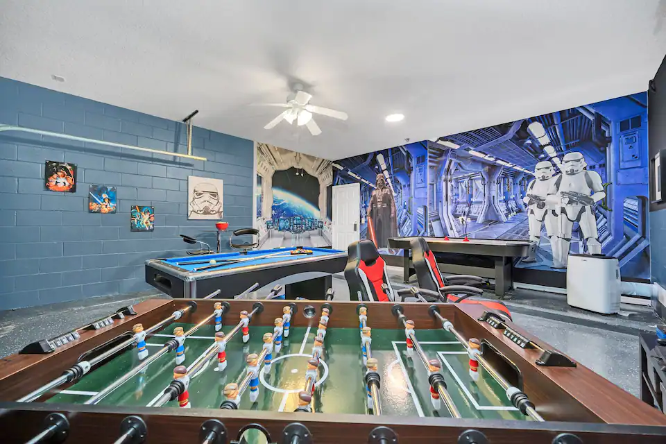 A look at the game room with the Foosball table in front
