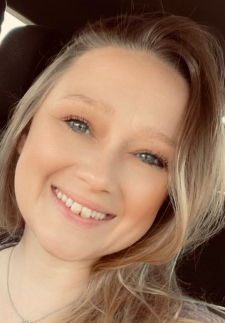 closeup of woman with blonde hair and makeup